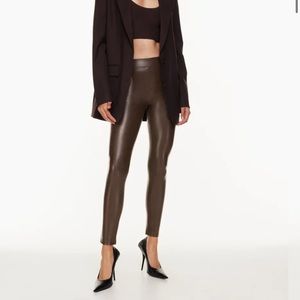 These are high-rise skinny pants with an elastic waist, made with Vegan Leather!